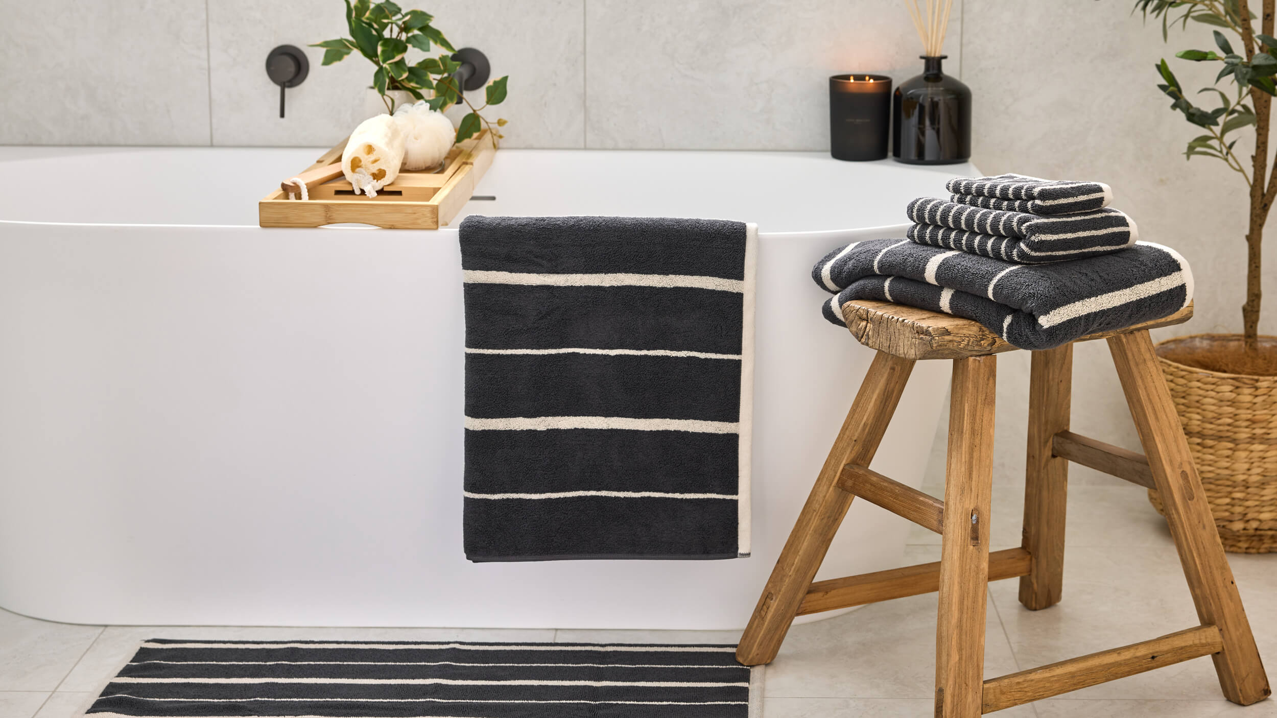 Royal Doulton Flynn charcoal towel set styled in a bathroom