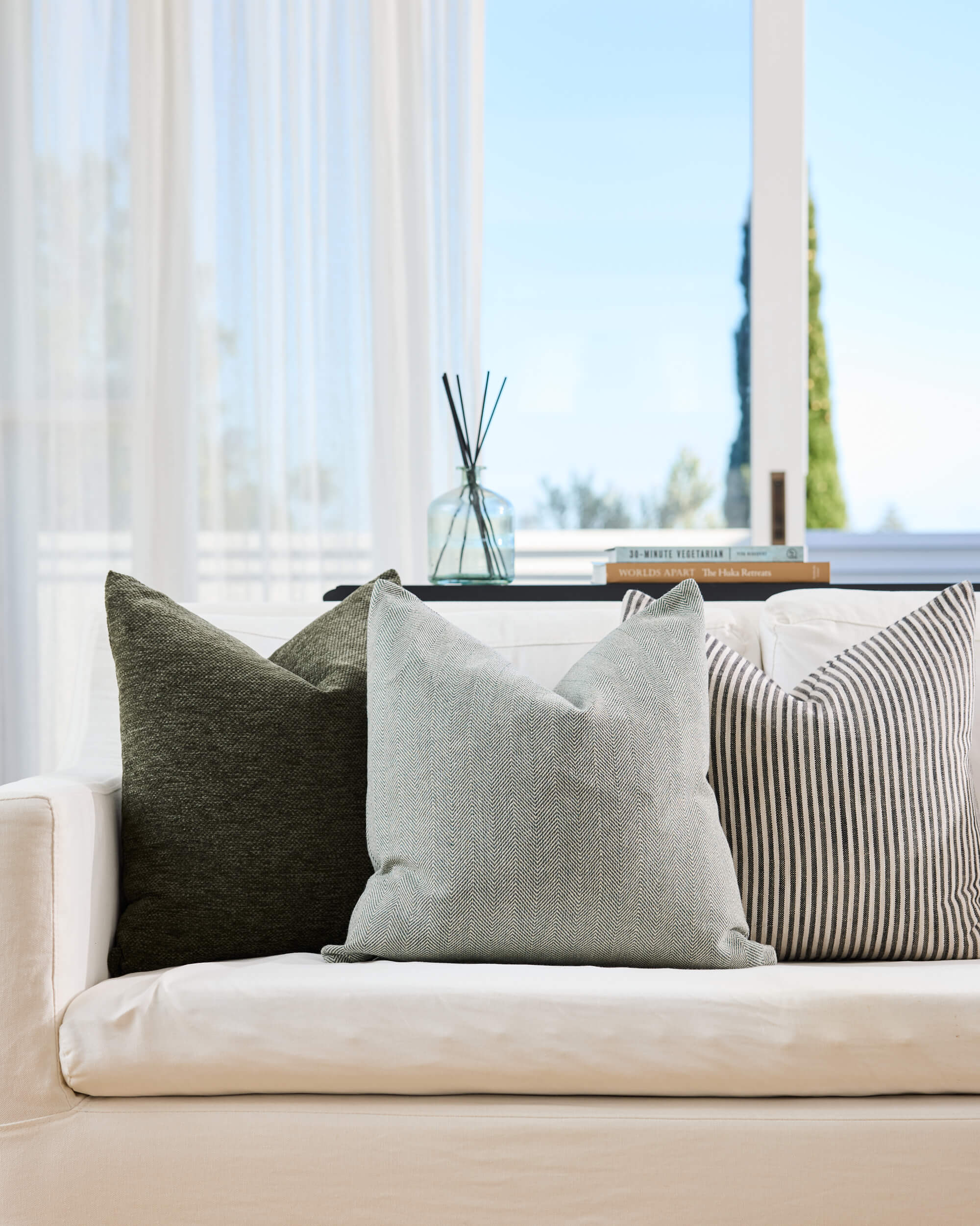 Royal Doulton green cushions styled in a living room
