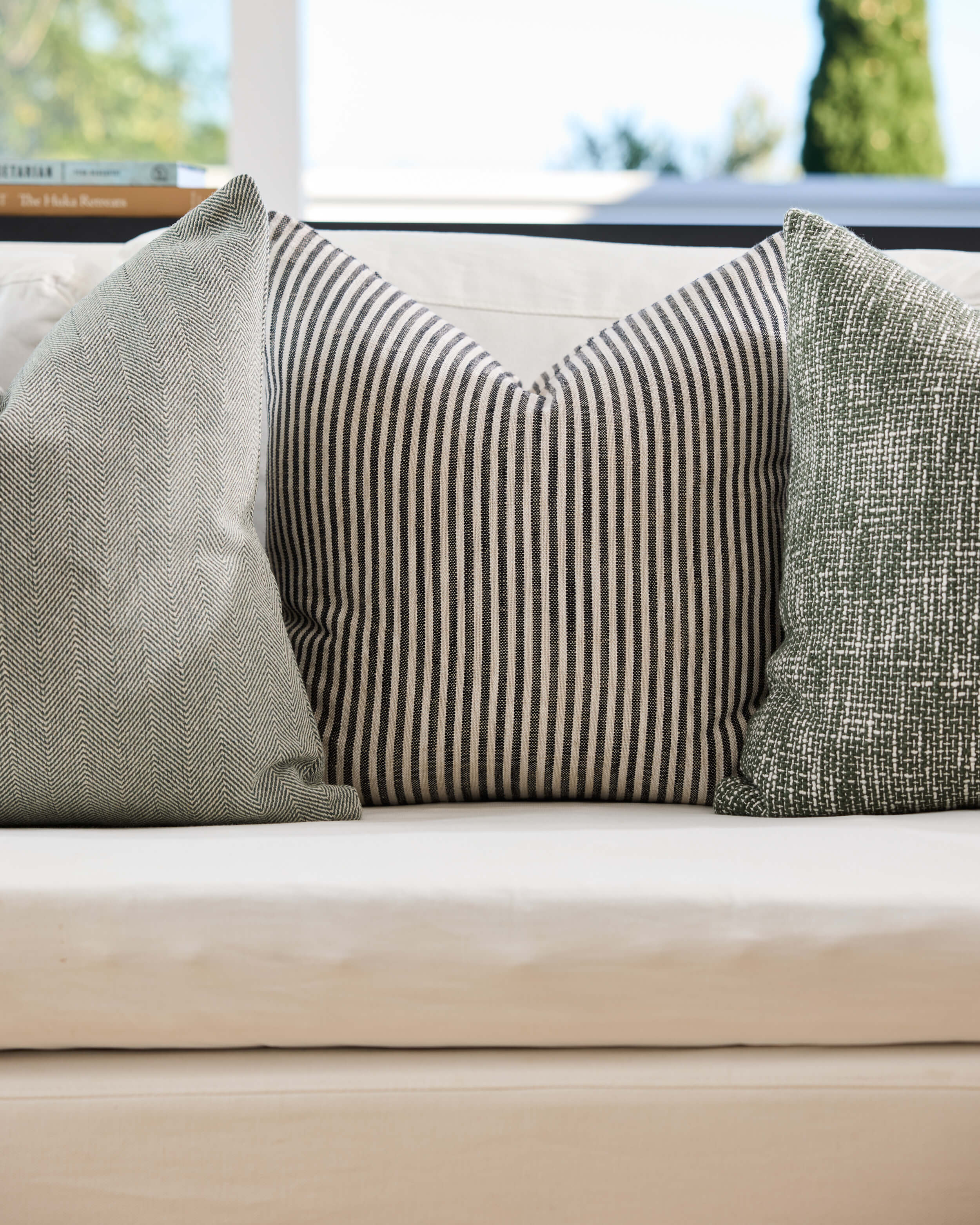 Royal Doulton green cushions styled in a living room