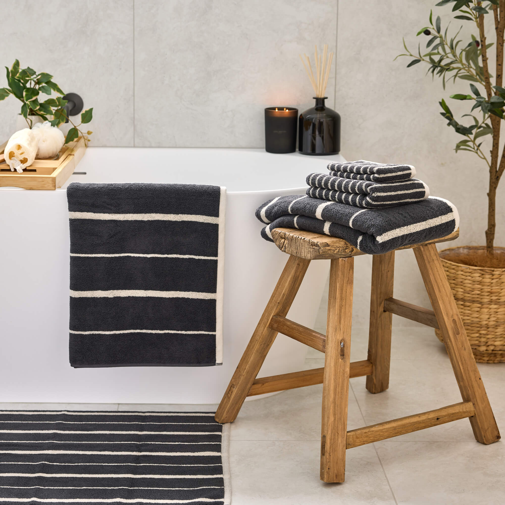 Royal Doulton Flynn towel collection in Charcoal styled in a bathroom