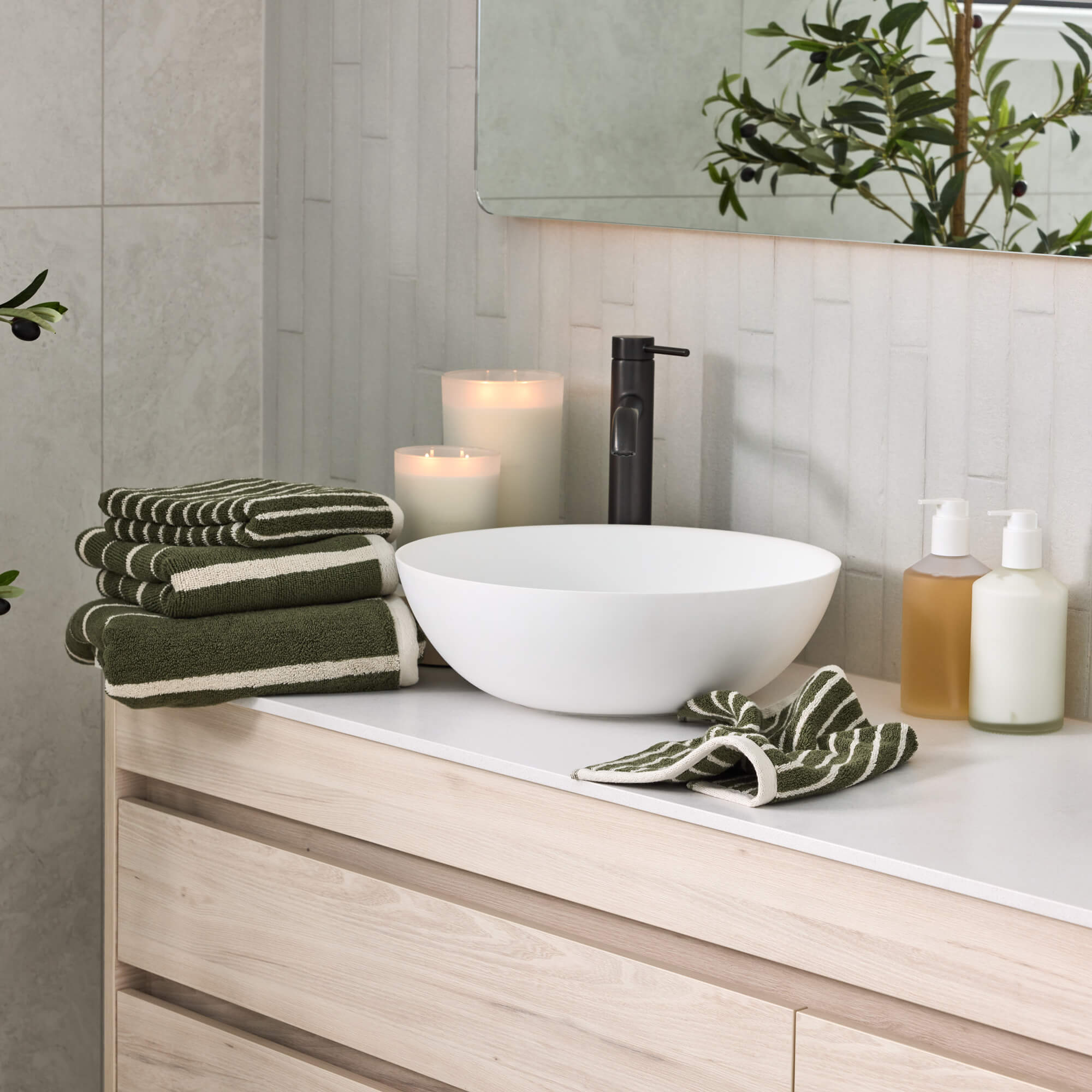 Royal Doulton Flynn towel collection in Moss styled in a bathroom